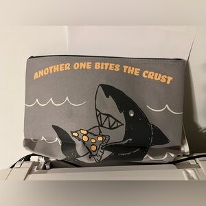 Brand new thirty one medium zipper pouch 
Another one bites the crust